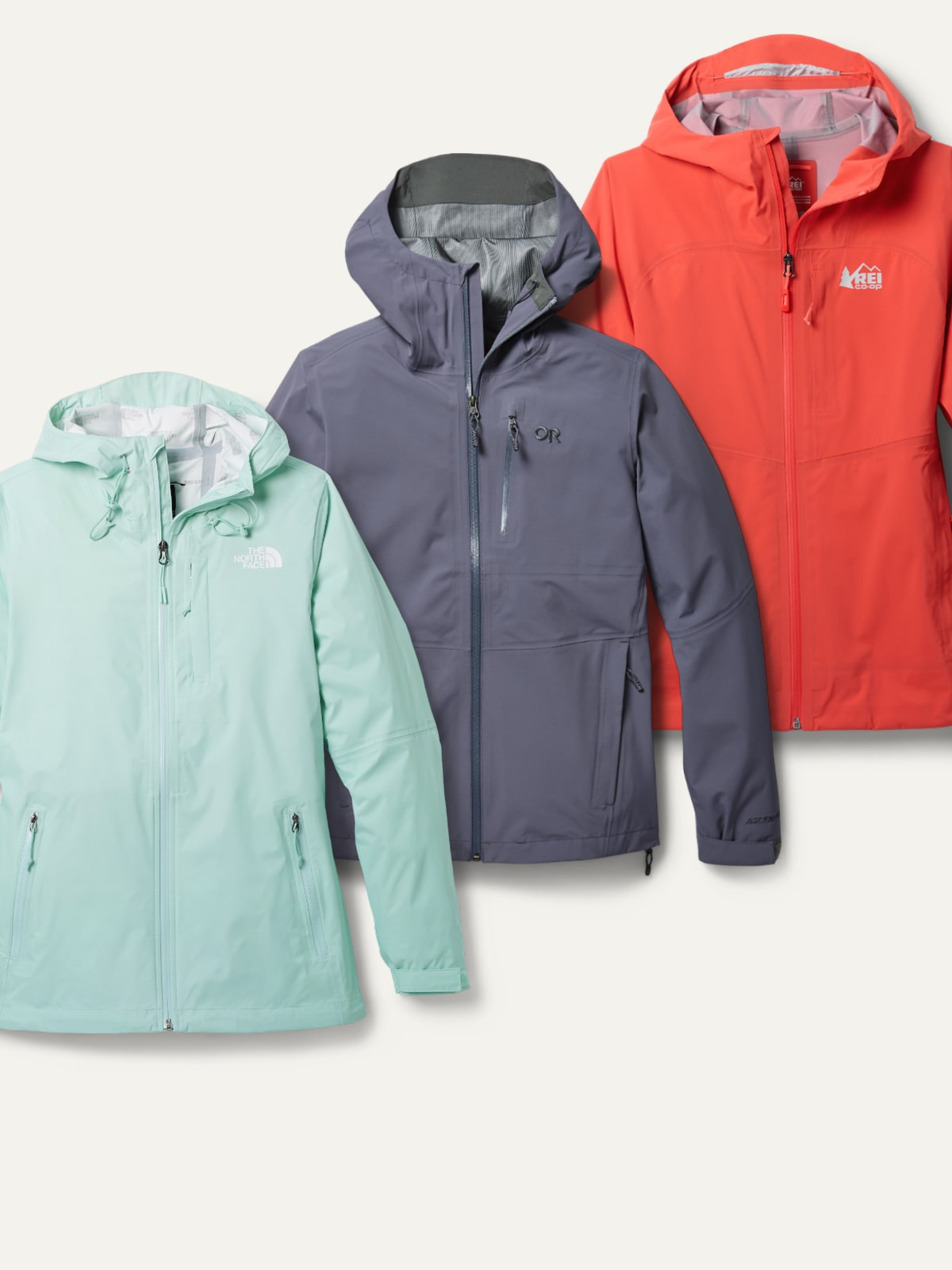 A collage of colorful rain jackets on a light colored background.