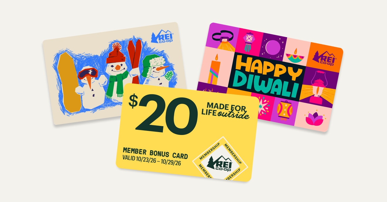 A yellow Member Bonus Card, a snowmen-themed gift card, & a Diwali-themed gift card on a light colored background.