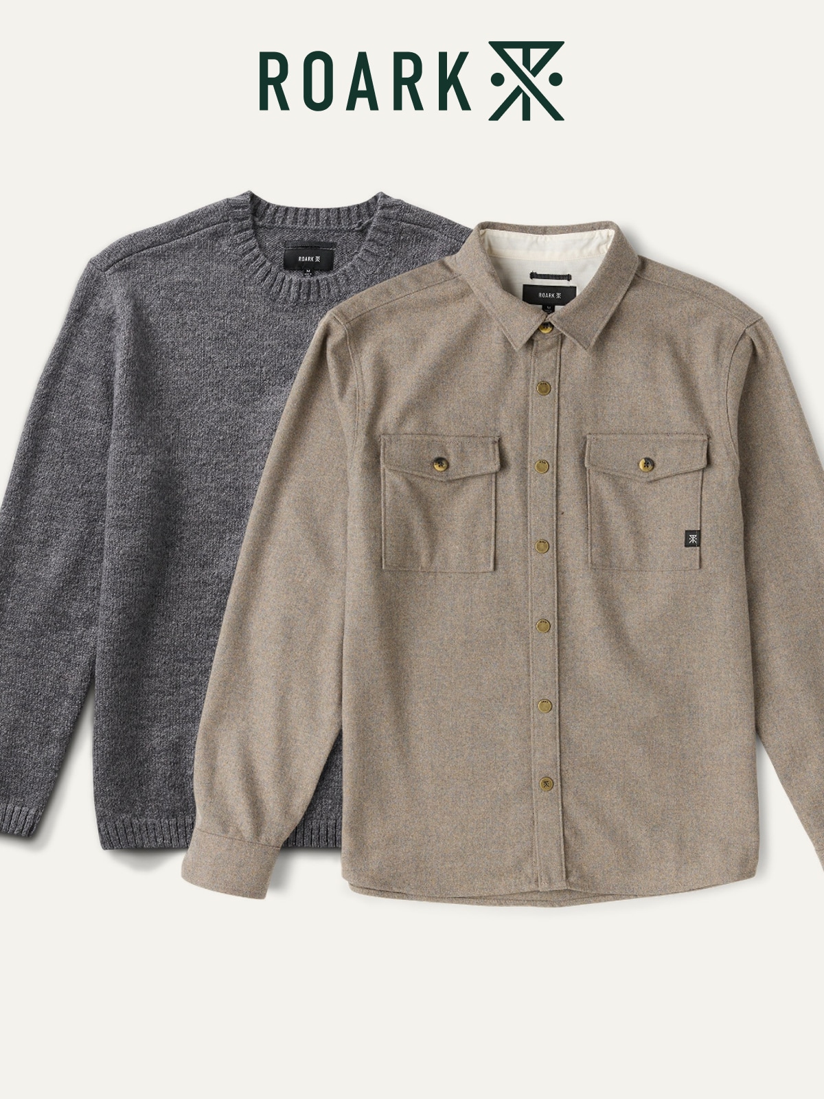 Two Roark shirts on a light colored background.
