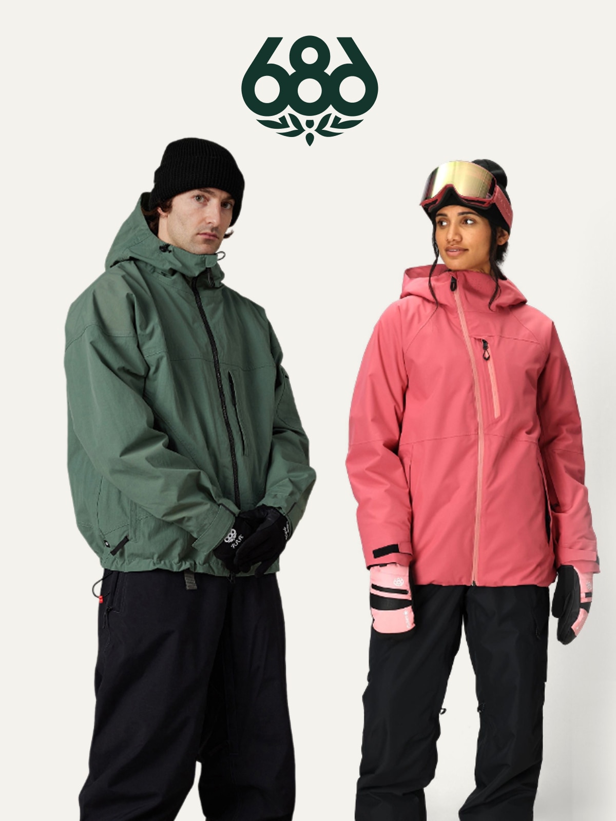 Two people wearing 686 snow clothing on a light colored background.