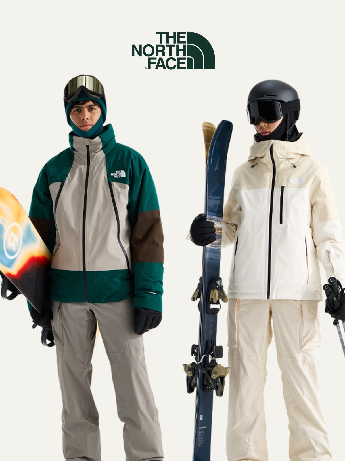 Two people wearing The North Face snow clothing on a light colored background.
