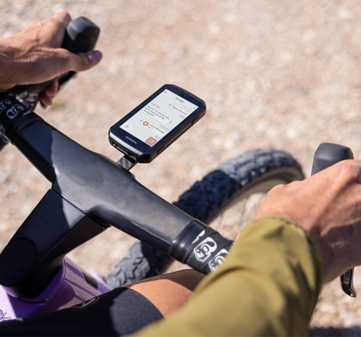 A view from above of a person riding their bike with a Garmin Edge 1060 Bike Computer.