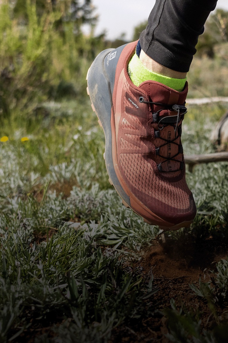 Runner on a trail wearing Salomon Sense Ride 4 Trail-Running Shoes