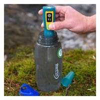 Using an ultraviolet light purifier to sterilize water in a bottle