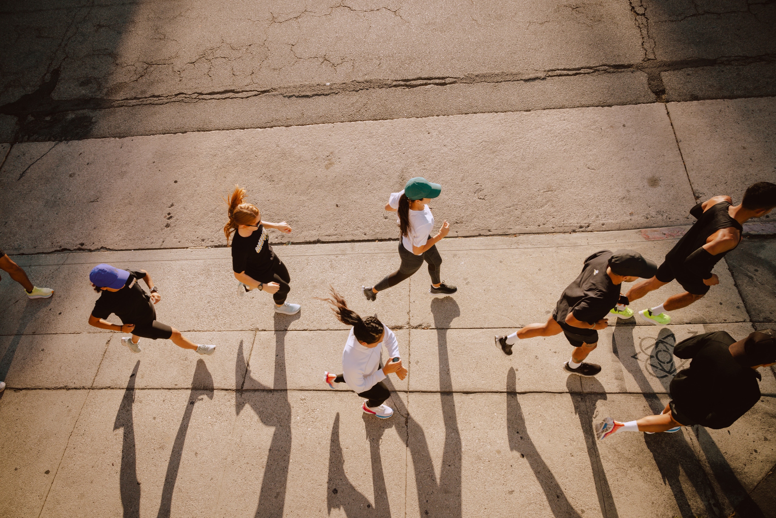 Running group makes their way down the sidewalk