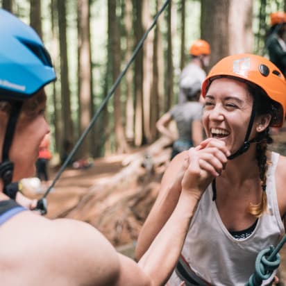 a rock climber laughing