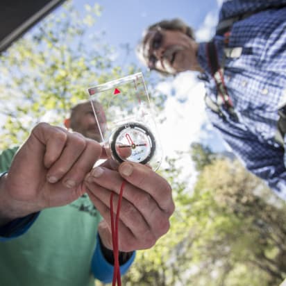 an instructor demonstrating how to use a compass