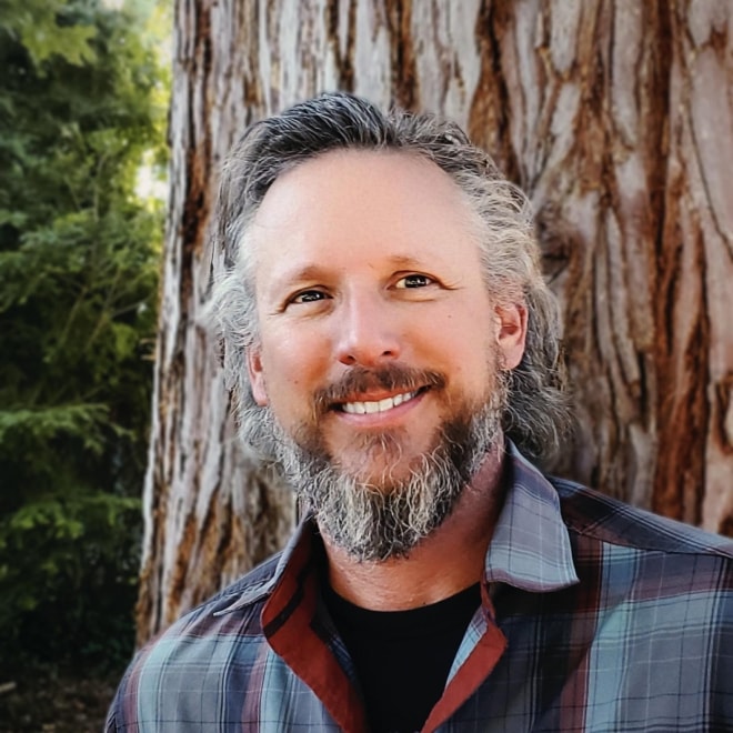 a headshot of REI guide Hadrian Klinkner