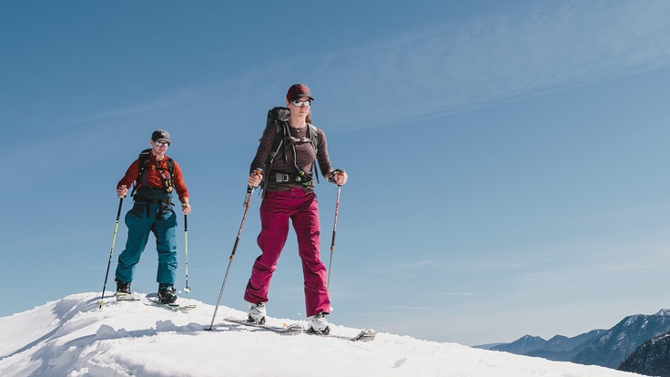 Backcountry skiers on a sunny day in the mountains