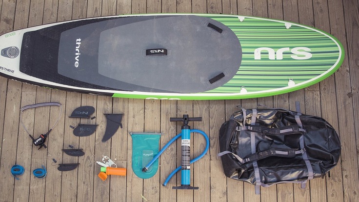 paddle boarding gear on the ground