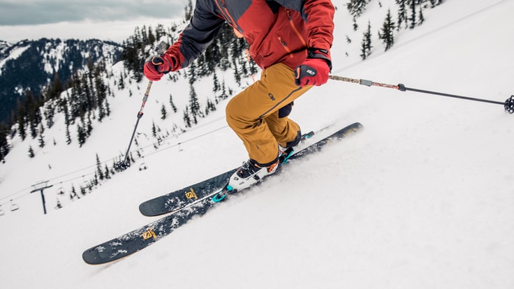 a downhill skier on the move