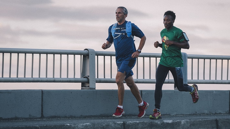 Two runners train for a marathon