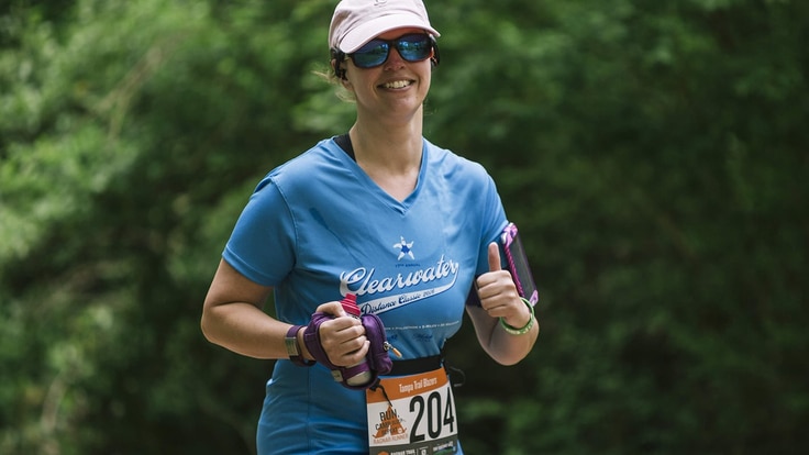 Happy runner with sunglasses