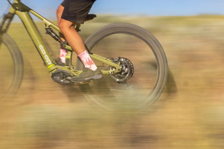 Cycling socks made of wool or synthetic materials can help wick away perspiration.