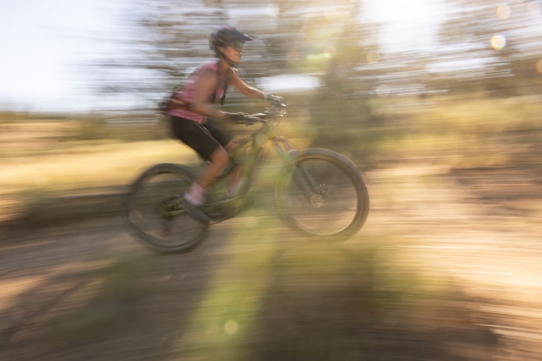 A mountain. biker riding on a trail
