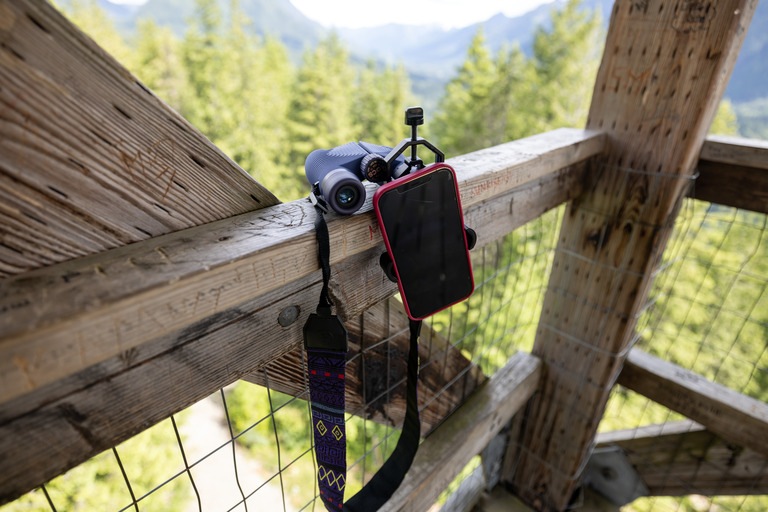 Pair of binoculars on a railing