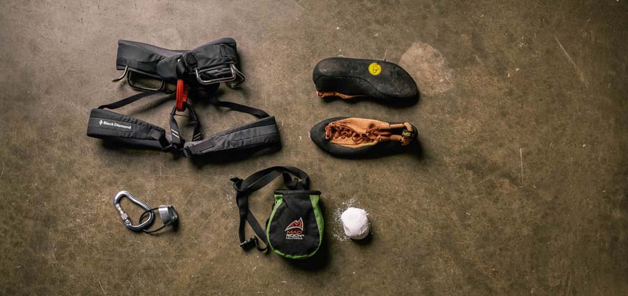 rock climbing shoes and harness