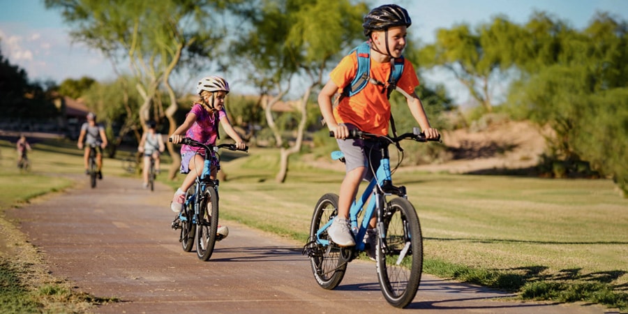 little kid riding bike