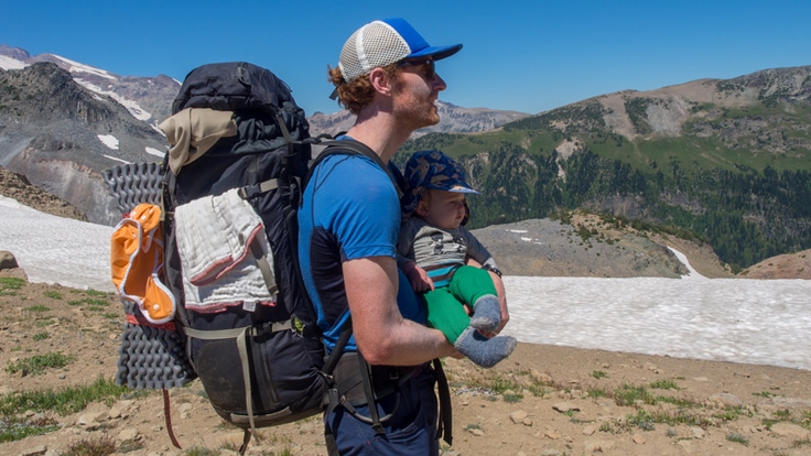 a father and infant son backpacking