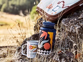 R E I water bottle, camp cup, and blanket