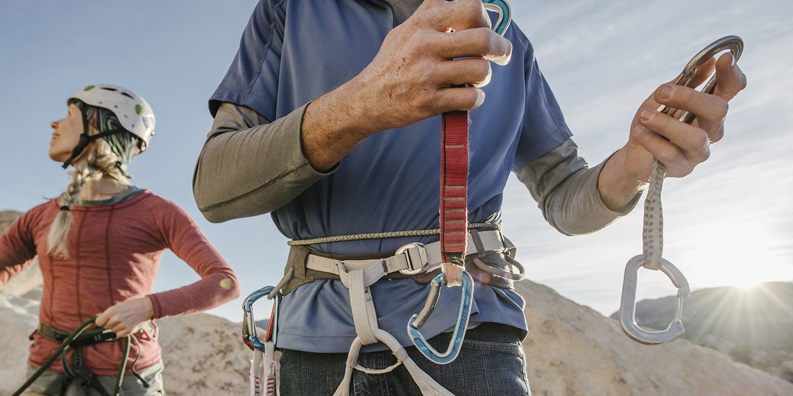 Climber holding two quickdraws