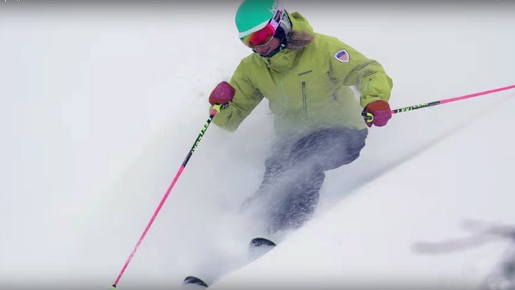 Skier on a steep run