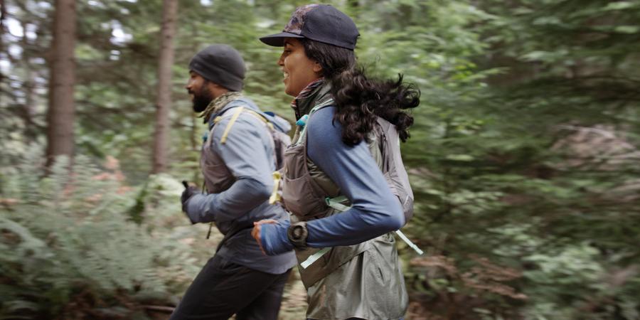 trail runners with straight shoulders and posture