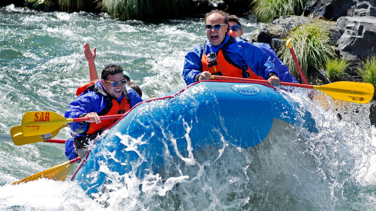 group of people river rafting