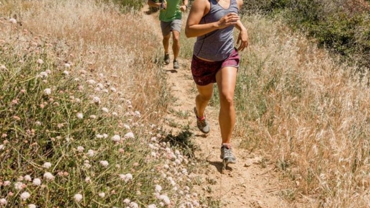 Runners on a trail