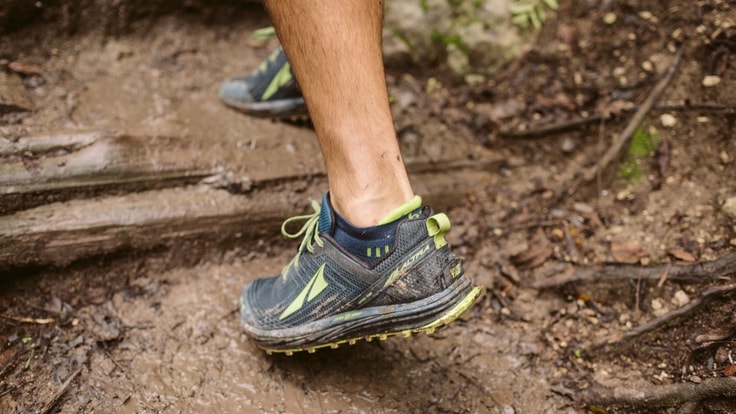 Muddy trail-running shoes.