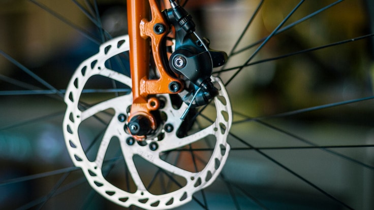 Close up of disc brake on a wheel.