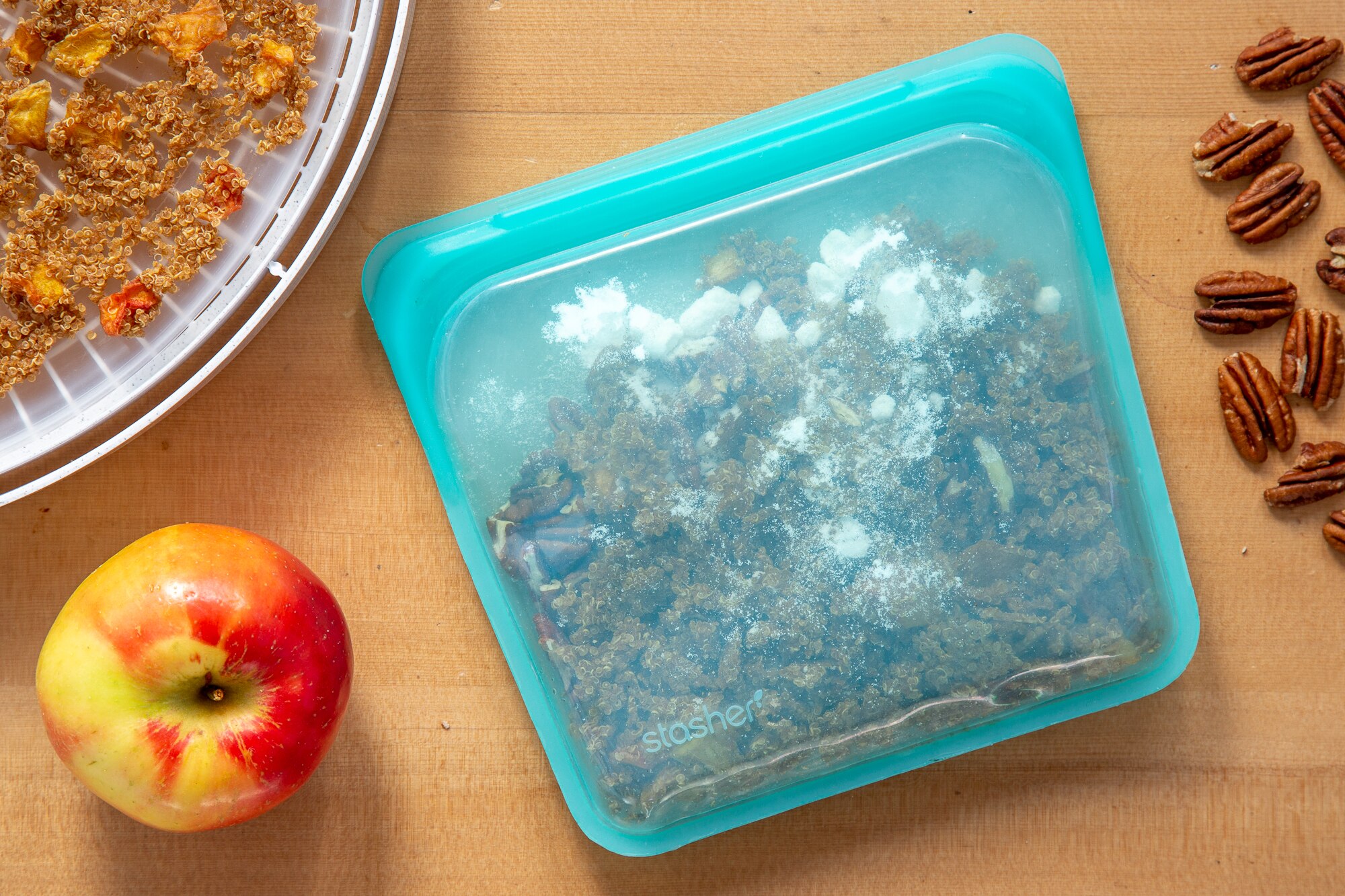Backpacking apple quinoa porridge in a reusable stasher bag