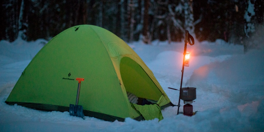 a 4-season backpacking tent pitched in the snow