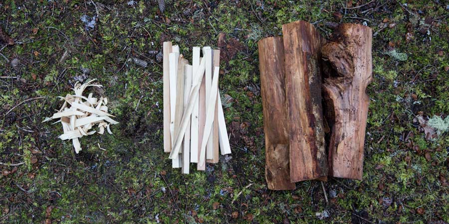 the various types of campfire fuel: tinder, kindling, and firewood