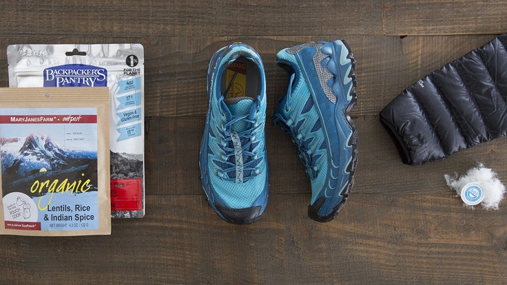 backpacking food, running shoe and down jacket