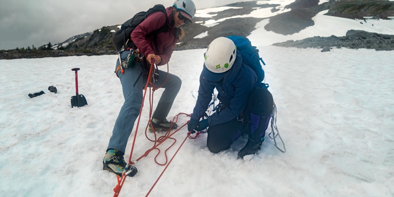 two climbers hauling on a z-pulley rescue system