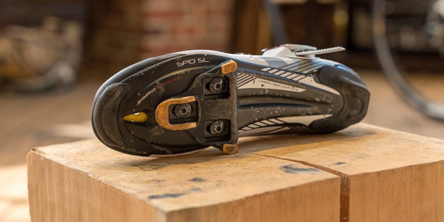 the cleat detail on the underside of a road cycling shoe