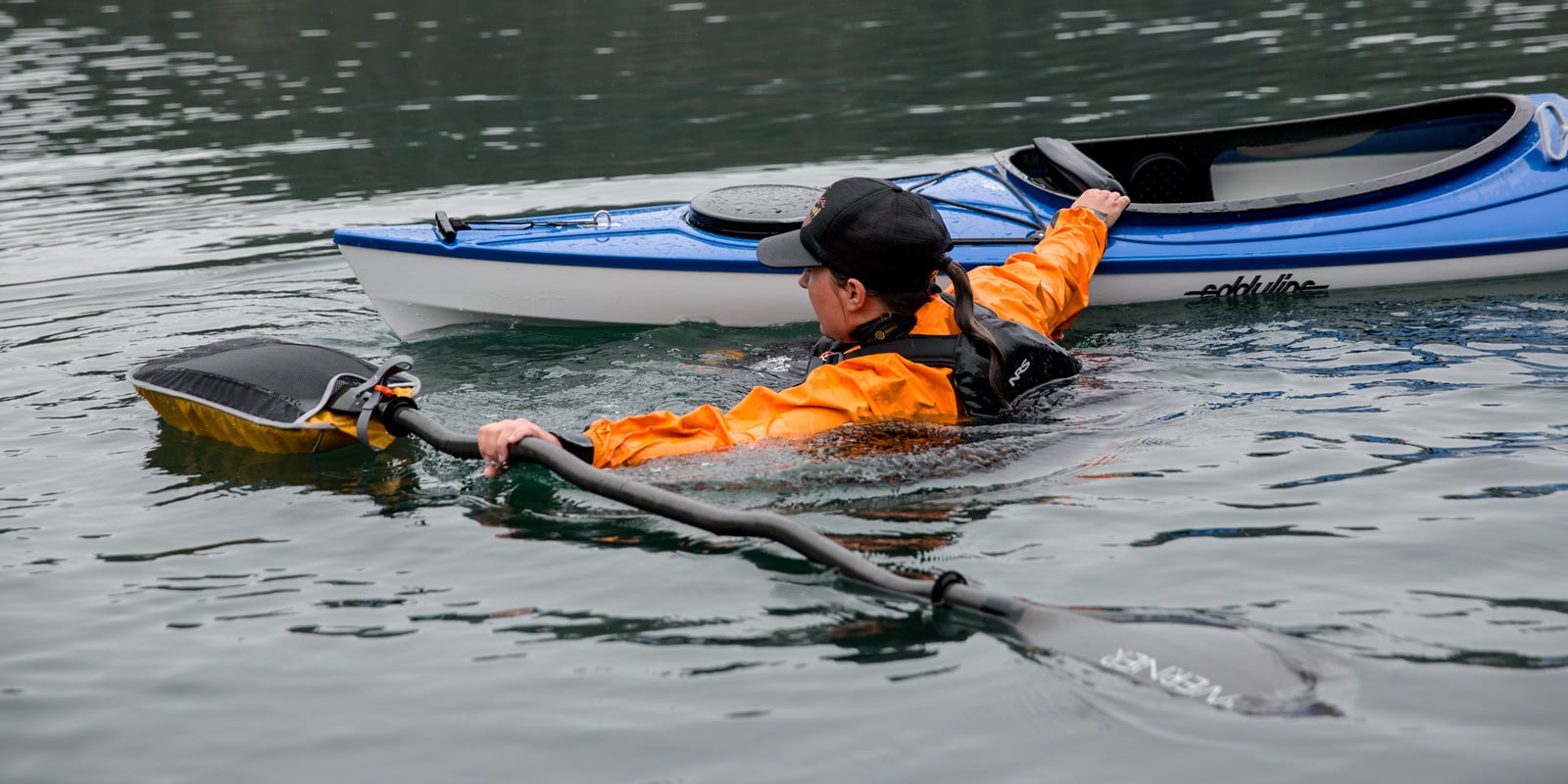 Instructor demonstrates what to do in the water