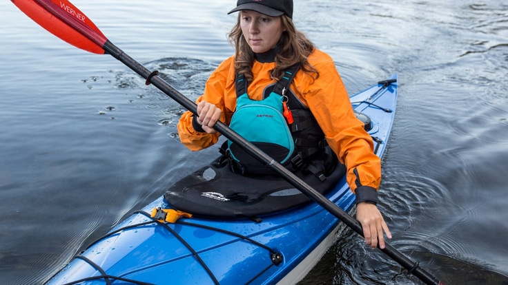 Person paddling a kayak