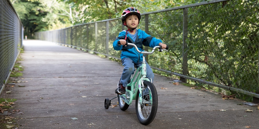 boy riding a bike