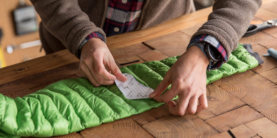 How to repair this small hole in my down jacket? Can I melt it closed, or  is that a terrible idea? : r/CampingGear