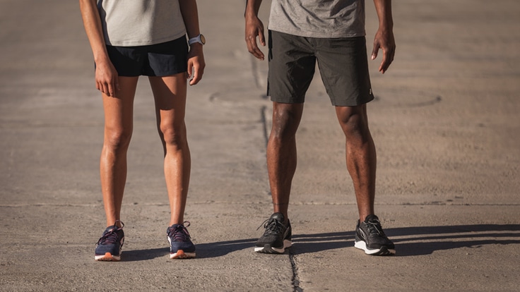 the legs of two runners