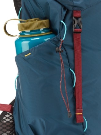 Outdoor Afro + REI Co-op Flash 22 Pack Water bottle pocket (Water bottle sold separately)