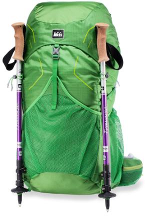 attaching trekking pole to backpack