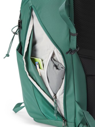 REI Co-op Ruckpack 30 Pack Side pocket with hidden zippered security pocket