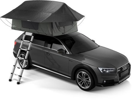 tents on top of cars