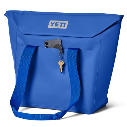 blue yeti bag Hopper M12 Backpack Soft Cooler Classic Navy Attach accessories such as YETIs Sidekick Dry Gear Case or Rambler Bottle Sling to the coolers HitchPoint Grid to keep gear in hands reach YETI Camino 20 Carryall Tote