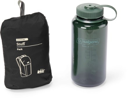 REI Co-op Stuff Travel Pack - 18 L Packs into interior stuff pocket (32 fl. oz. bottle for scale; not included)
