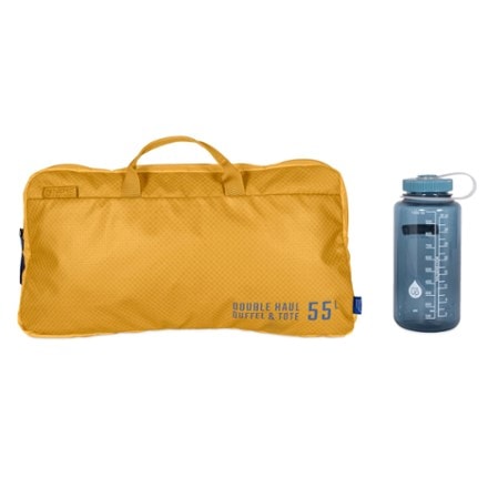 NEMO Double Haul 55 L Convertible Duffel and Tote 32 fl. oz. bottle for scale (not included)