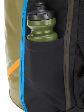 Cotopaxi Allpa 42 L Travel Pack Water bottle pocket (Water bottle sold separately)